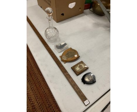 A FOUR FOOT YARD STICK, THREE MOTOR BIKE TROPHIES, A PISTOL KEY RING AND A CUT GLASS DECANTER 