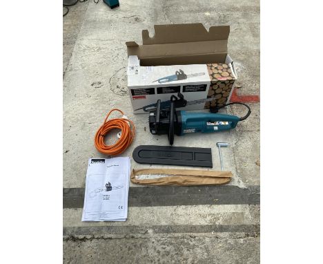 A MAKITA UC 4001 A 240 VOLT ELECTRIC CHAINSAW WITH ACCESSORIES - AS NEW IN BOX - IN WORKING ORDER 