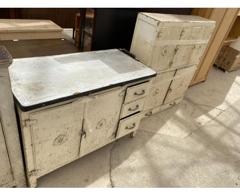 A VINTAGE METAL KITCHEN DRESSER CABINET WITH EIGHT DOORS AND THREE DRAWERS 