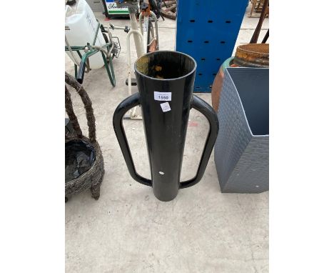 A METAL POST KNOCKER 