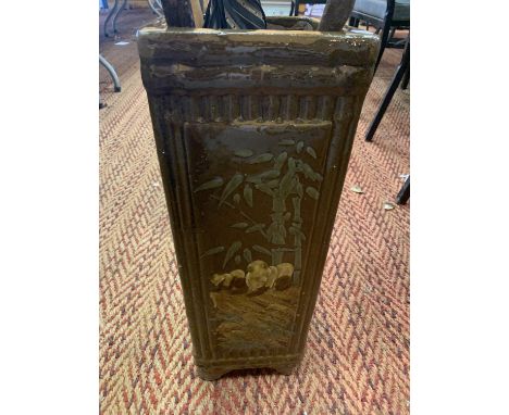 A CERAMIC STICK STAND WITH ORIENTAL SCENES 