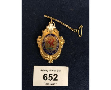 A GILT METAL ENAMEL CARDIFF BREAD CAKE AND CONFECTIONERY EXHIBITION MEDALLION 