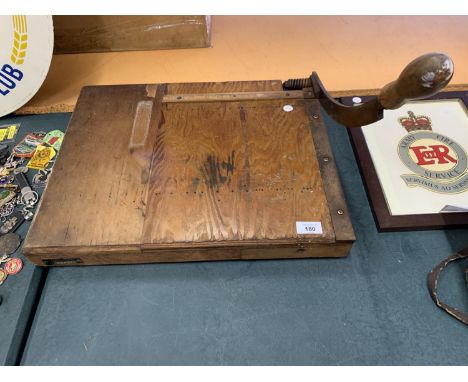 A VINTAGE WOODEN GUILLOTINE WITH 'ILFORD LIMITED' PLATE PLANT REGISTER 26457 