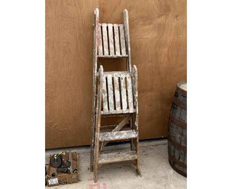 TWO SETS OF VINTAGE WOODEN STEP LADDERS TO INCLUDE A TWO RUNG AND FOUR RUNG 