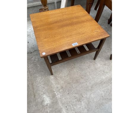 A SMALL RETRO TEAK COFFEE TABLE WITH SLATTED LOWER SHELF 