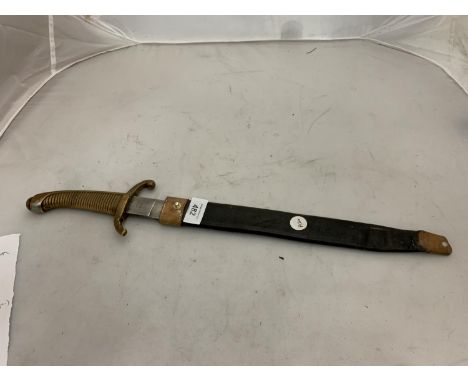 A KNIFE 31CM BLADE WITH BRASS GRIP AND LEATHER SCABBARD. BLADE STAMPED 