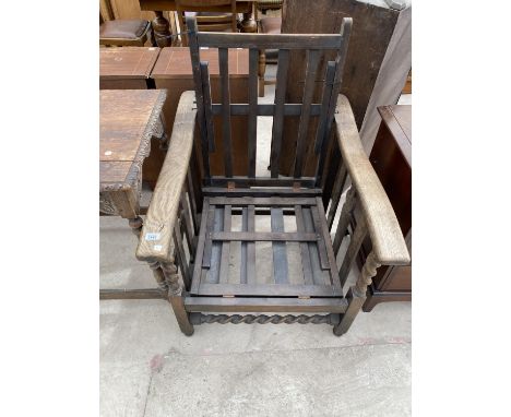 A VINTAGE OAK RECLINER CHAIR FRAME WITH BARLEY TWIST SUPPORTS - FOR RENOVATION 
