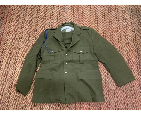 AN ARMY OFFICERS JACKET AND TROUSERS 