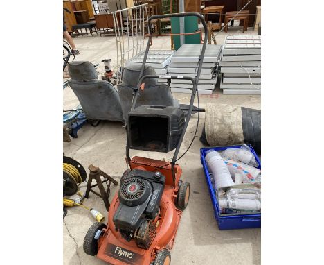 A FLYMO PETROL ROTARY MOWER WITH GRASS BOX 