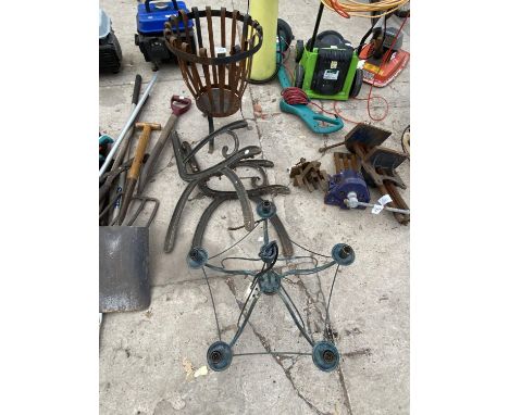 A FIVE BRANCH CENTRE LIGHT, TWO CAST IRON BENCH ENDS AND A METAL LEAF BASKET 