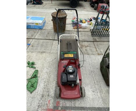 A MOUNTFIELD EMPRESS PETROL ROTARY LAWNMOWER 