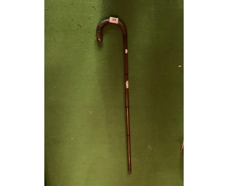 A SHOOTING STYLE STICK 