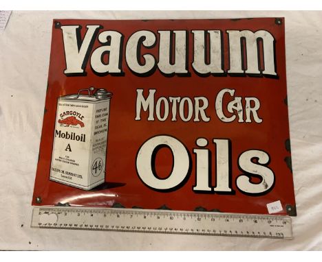 AN ENAMEL SIGN 'VACUUM MOTOR CAR OILS' 