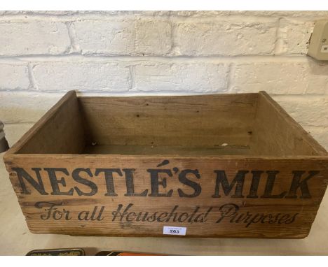 A VINTAGE NESTLES MILK WOODEN BOX 