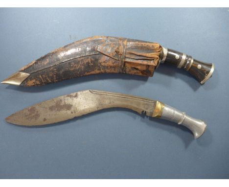 A KUKRI KNIFE WITH SCABBARD AND KARDA KNIVES AND A FURTHER KUKRI BLADE 