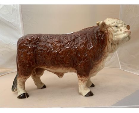 A LARGE BUTCHER'S SHOP CERAMIC HEREFORD BULL 