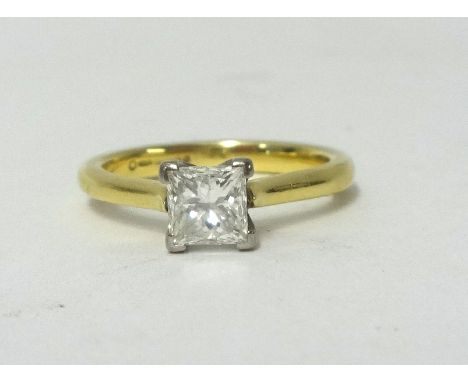 An 18ct diamond set solitaire ring, the princess cut diamond approx 0.75 ct, colour K/L, clarity VSI / VSII, size K, 4g. with