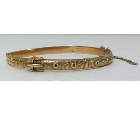 A 9ct gold bangle, approx 7.90gms.