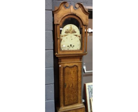 A mid 19th Century oak and mahogany crossbanded longcase clock, the painted arch dial with eight day movement currently detac