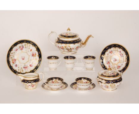 A 19th Century teaset comprising teapot and stand, lemon water bowl, sucrier, milk jug, two serving plates, twelve teacups, t