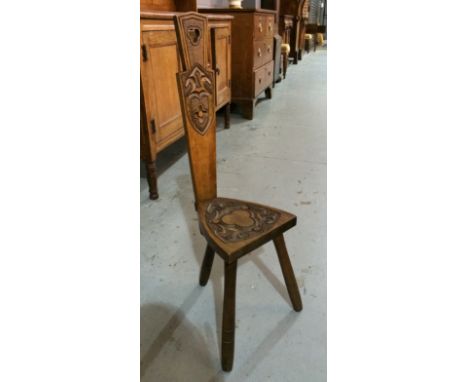 A 20th Century spinning chair by Ben Setter of Totnes, with a clover-shaped pierced splat back over conforming carved detail 