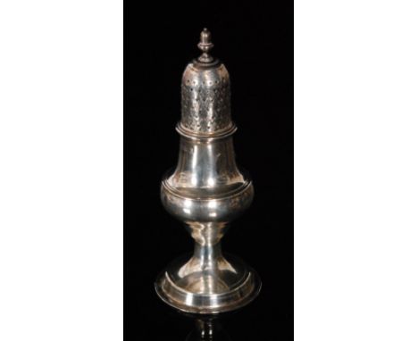 A George III hallmarked silver castor of plain baluster form terminating in acorn finial, height 14cm, possibly Henry Bailey.