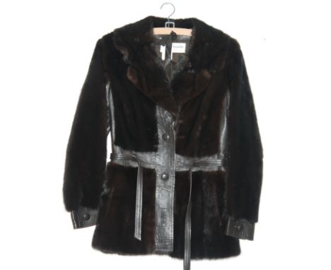 A lady's vintage Sefton Mark of Solihull half length fur coat (probably mink) with contrasting leather detailing and a sash b