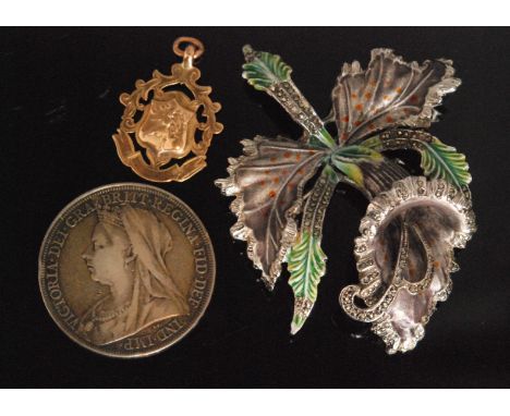 A 9ct hallmarked fob with a Victorian crown and a mid 20th Century white metal marcasite and enamel brooch modelled as an orc