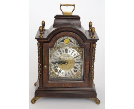 A 1960s 18th Century style walnut cased bracket clock with eight day movement and moon phase on scroll feet, height 22cm