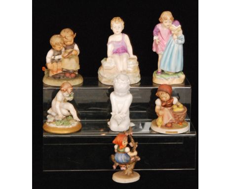 Seven assorted figures to include three Goebel Hummel figures, a Naples figure of a cherub, a Paragon model of a girl in her 