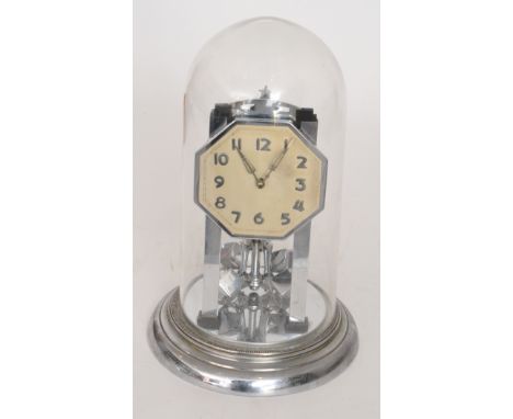 A 1950s Art Deco revival 365 day mantle clock with cube chrome pendulum in glass dome, height 32cm