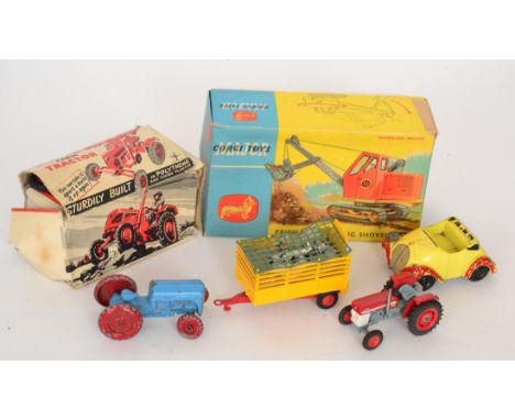 A British made pull-apart toy tractor together with other diecast tractors, a Corgi Priestman luffing shovel No 1128 etc