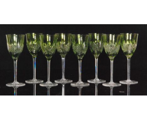 A set of 20th Century St Louis crystal wine glasses with a green over clear tulip form bowl, flash cut with a repeat panel de