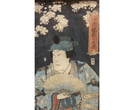 ATTRIBUTED TO UTAGAWA KUNISADA (1786-1865) - Actor with open fan, wood block print, framed, 35cm x 22cm