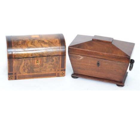 A Victorian figured walnut and line inlaid two divisioned tea caddy together with a sargophical shaped tea caddy (2)