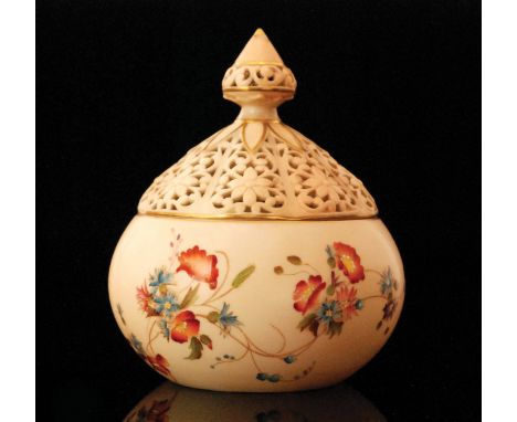 A Grainger, Worcester Royal China Works vase and reticulated cover, the ovoid body decorated with spring flowers against a bl