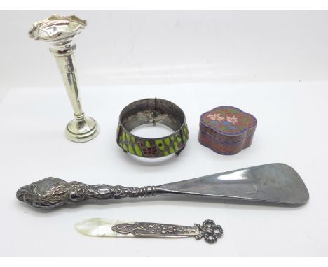 A small silver posy vase, a continental silver and enamel salt (lacking liner), a cloisonne trinket box, silver handled shoe 