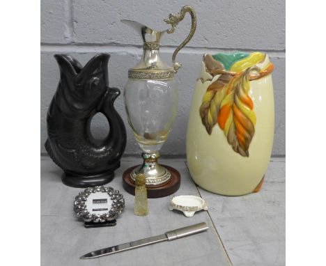 A Clarice Cliff vase, a/f, a Dartmouth fish vase, a claret jug, etc. **PLEASE NOTE THIS LOT IS NOT ELIGIBLE FOR POSTING AND P