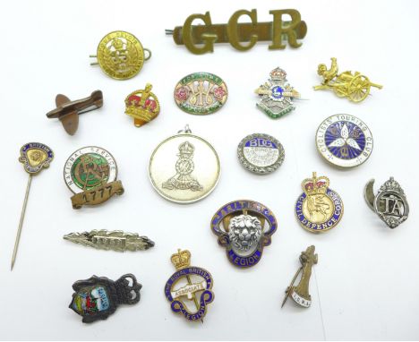 A silver Sherwood Foresters Regimental badge, a National Service enamel badge, a TA badge numbered 435959, BDG German badge a