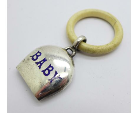 A hallmarked silver and enamel 'Baby' rattle, Birmingham 1926, (ring a/f, cracked) 