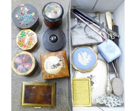 A collection of compacts, button hooks, trinket pots, etc. 