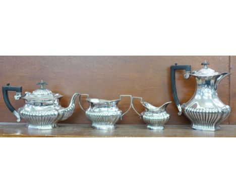 A four piece EPNS tea service with 1914 wedding inscription 