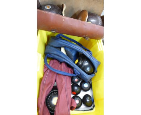 Three sets of bowls and a set of carpet bowls 
