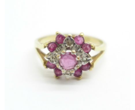 A 9ct gold, ruby and diamond ring, 2.6g, N 