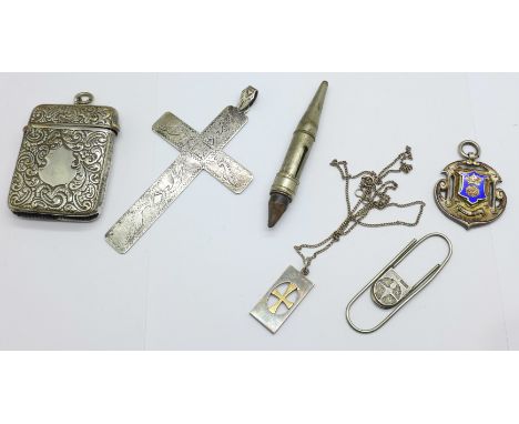 A silver and enamel fob, a plated vesta case, a Finnish silver and gold fronted pendant and chain, a silver cross pendant and