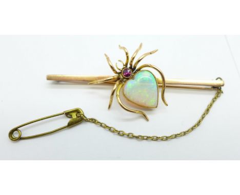 A 9ct gold, opal and garnet set spider brooch, by Saunders &amp; Shepherd, 9g, bar 75mm 