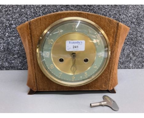 A Smiths oak case mantle clock with key