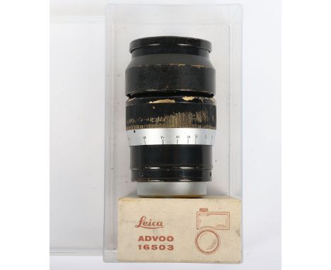 A Leitz Hektor 7.3cm f/1.9 Lens, serial no. 141087, chrome and black barrel, with makers back cap and lens hood, together wit