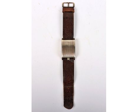 An Art Deco gentleman’s silver tank style wristwatch, movement signed Talis, cloisonne enamel dial with Arabic numerals, 25mm
