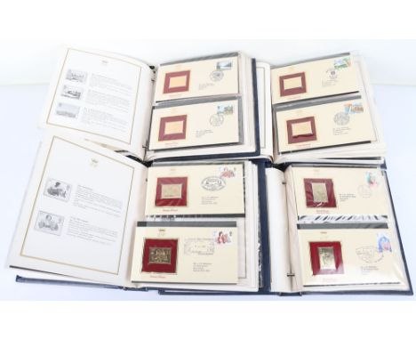 Various commemorative coin packs with five folders of 22ct Golden Replica of British Stamps, coin packs include Year 2000 set